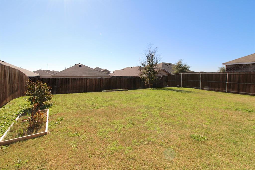 949 Shire Avenue Haslet, TX 76052 - Photo 16 of 22 View of fenced backyard