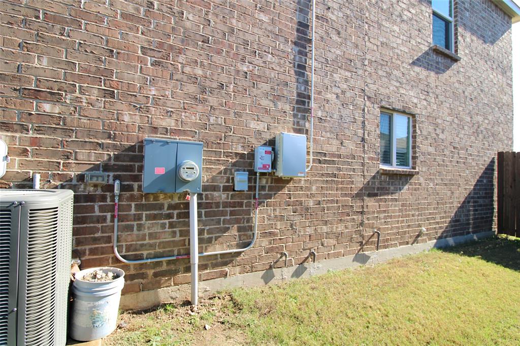 949 Shire Avenue Haslet, TX 76052 - Photo 19 of 22 Exterior view of brick siding
