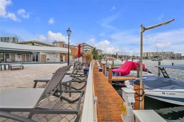 a view of a chairs and tables in the patio