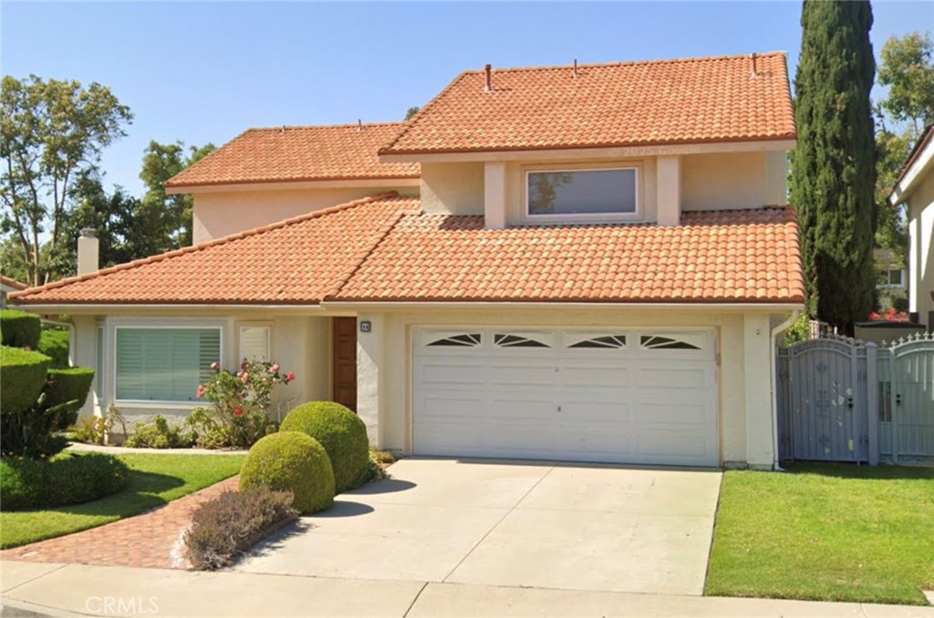 64 Bluecoat Irvine, CA 92620 - Photo 1 of 1 a view of a house with a yard