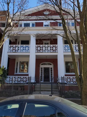 a sign that is on the side of a building