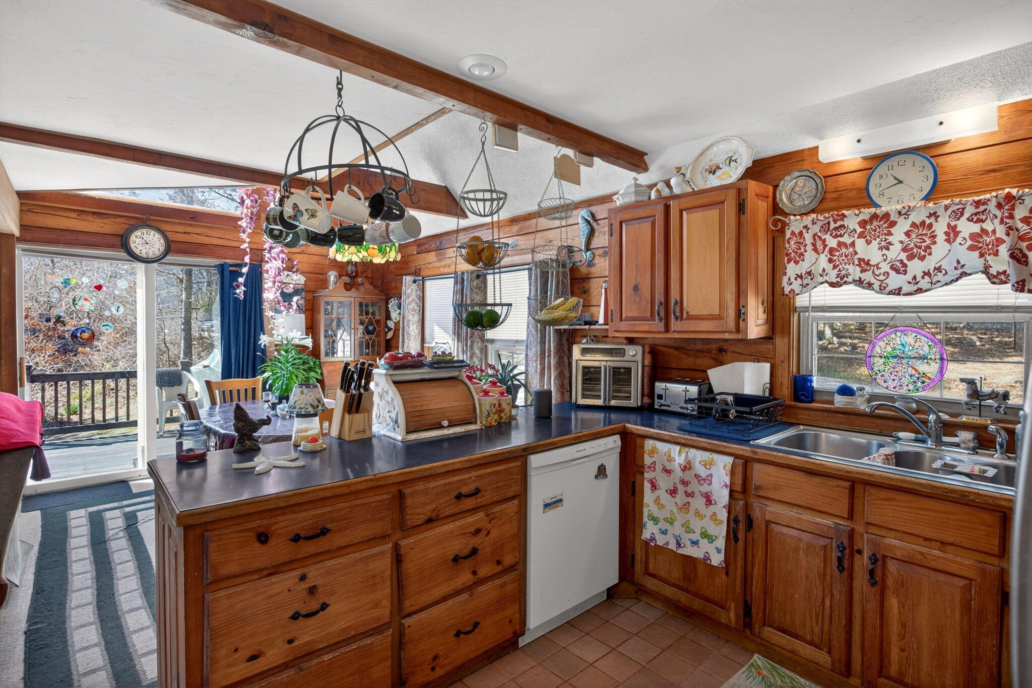 73 County Road Bourne, MA 02532 - Photo 37 of 91 a kitchen with lots of counter top space and wooden floor