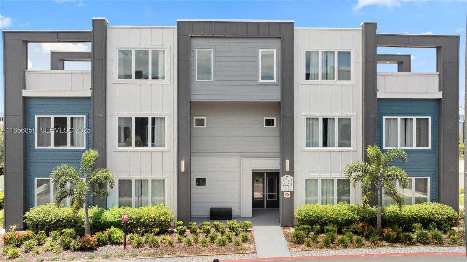 7740 Sandy Ridge Drive, Unit 112 Kissimmee, FL 34747 - Photo 2 of 38 a front view of a multi story building