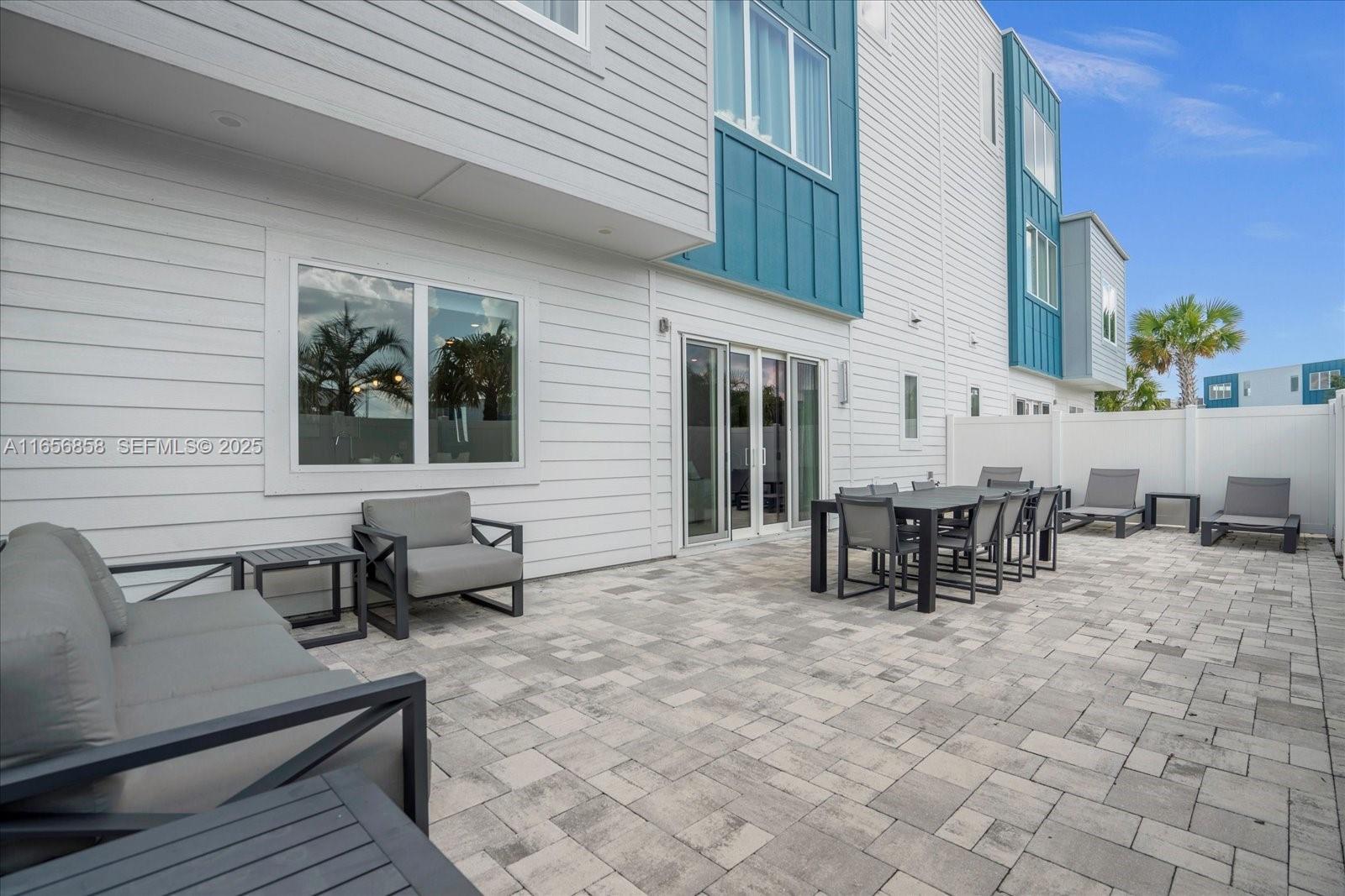 7740 Sandy Ridge Drive, Unit 112 Kissimmee, FL 34747 - Photo 25 of 38 a view of outdoor space with seating area
