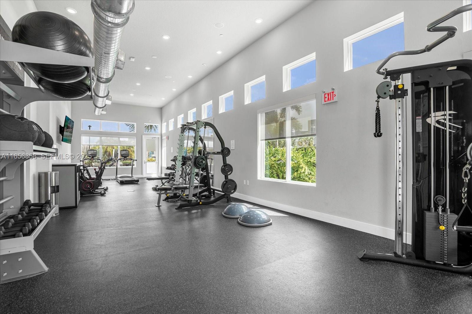 7740 Sandy Ridge Drive, Unit 112 Kissimmee, FL 34747 - Photo 27 of 38 a view of a room with gym equipment