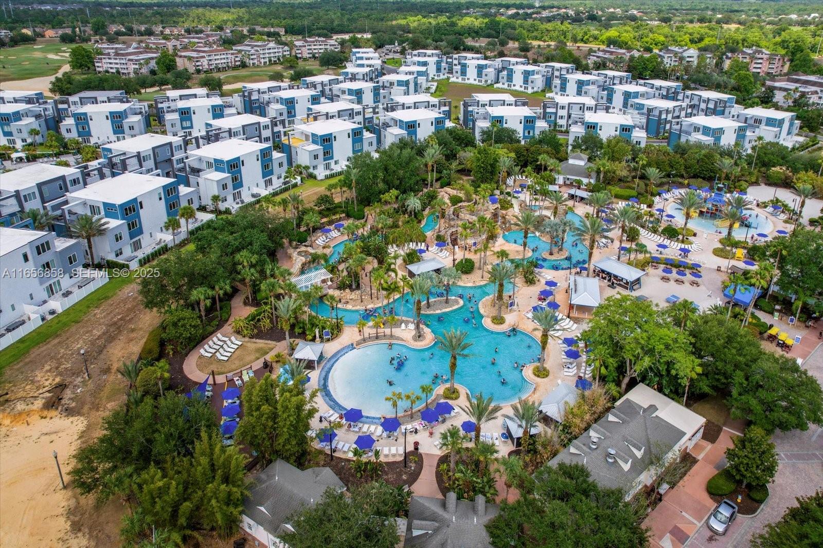7740 Sandy Ridge Drive, Unit 112 Kissimmee, FL 34747 - Photo 37 of 38 an aerial view of residential house with outdoor space and swimming pool