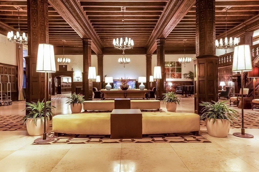 20 Chapel Street, Unit B801 Brookline, MA 02446 - Photo 16 of 27 a building outdoor space with patio furniture and potted plants