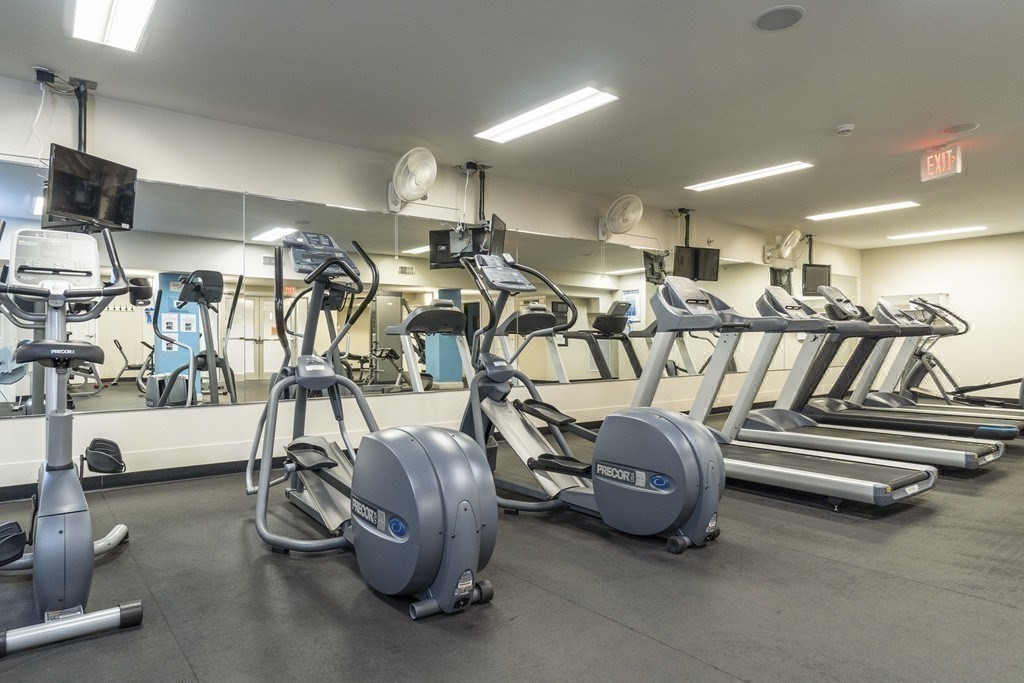 20 Chapel Street, Unit B801 Brookline, MA 02446 - Photo 21 of 27 a view of a room with gym equipment
