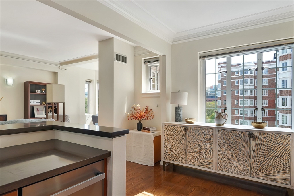 20 Chapel Street, Unit B801 Brookline, MA 02446 - Photo 4 of 27 a living room with furniture and large windows