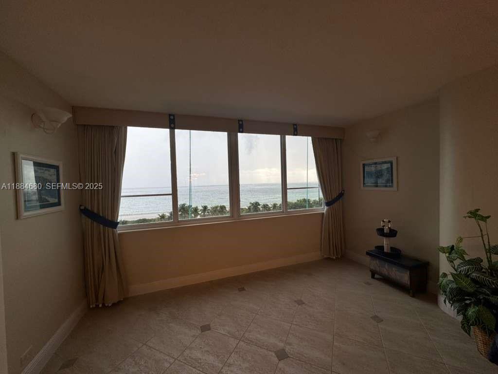 5005 Collins Avenue, Unit 714 Miami Beach, FL 33140 - Photo 19 of 36 a room with window