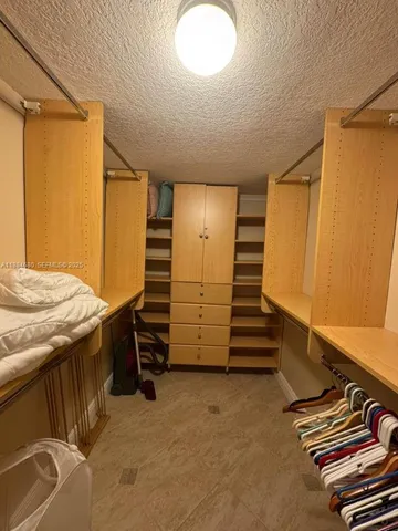 a view of room with stairs and furniture