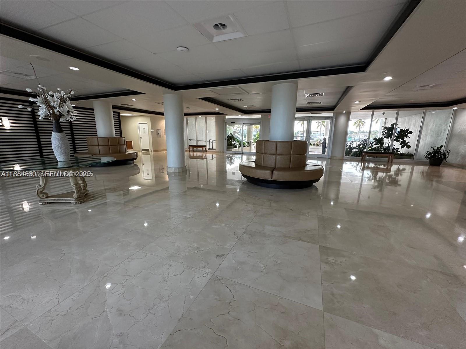 5005 Collins Avenue, Unit 714 Miami Beach, FL 33140 - Photo 27 of 36 a view of a room with gym equipment