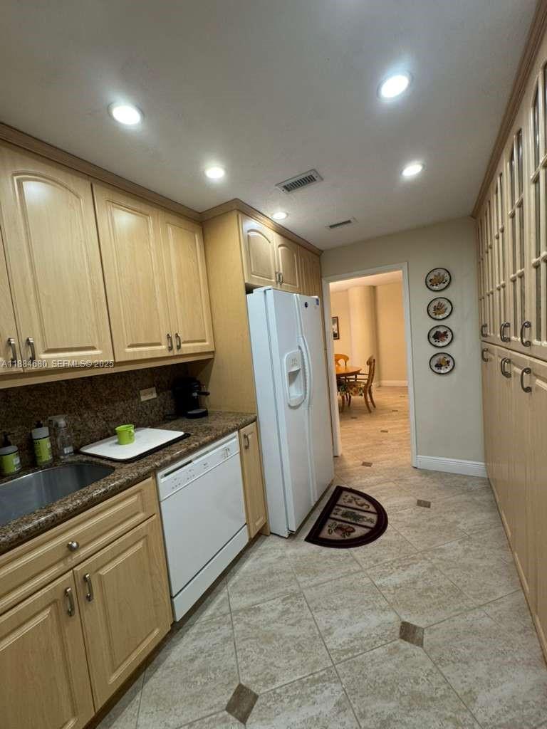 5005 Collins Avenue, Unit 714 Miami Beach, FL 33140 - Photo 6 of 36 a view of a storage & utility room with stuff