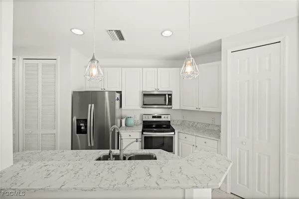 $319,900 | 1340 Sweetwater Cove, Unit 202, Naples, FL 34110