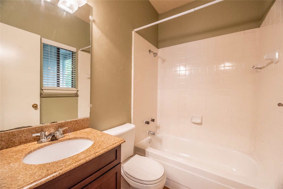601 Nelray Boulevard, Unit 5 Austin, TX 78751 - Photo 9 of 13 Full bathroom with shower / bathtub combination and vanity