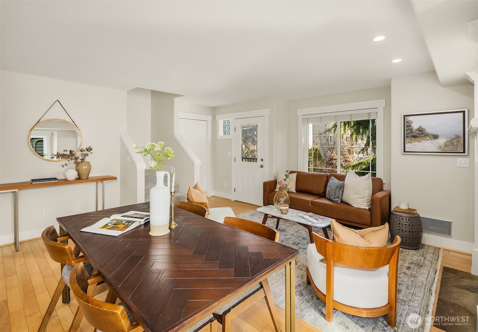 739 North 94th Street, Unit B Seattle, WA 98103 - Photo 13 of 39 a living room with dining table and chairs