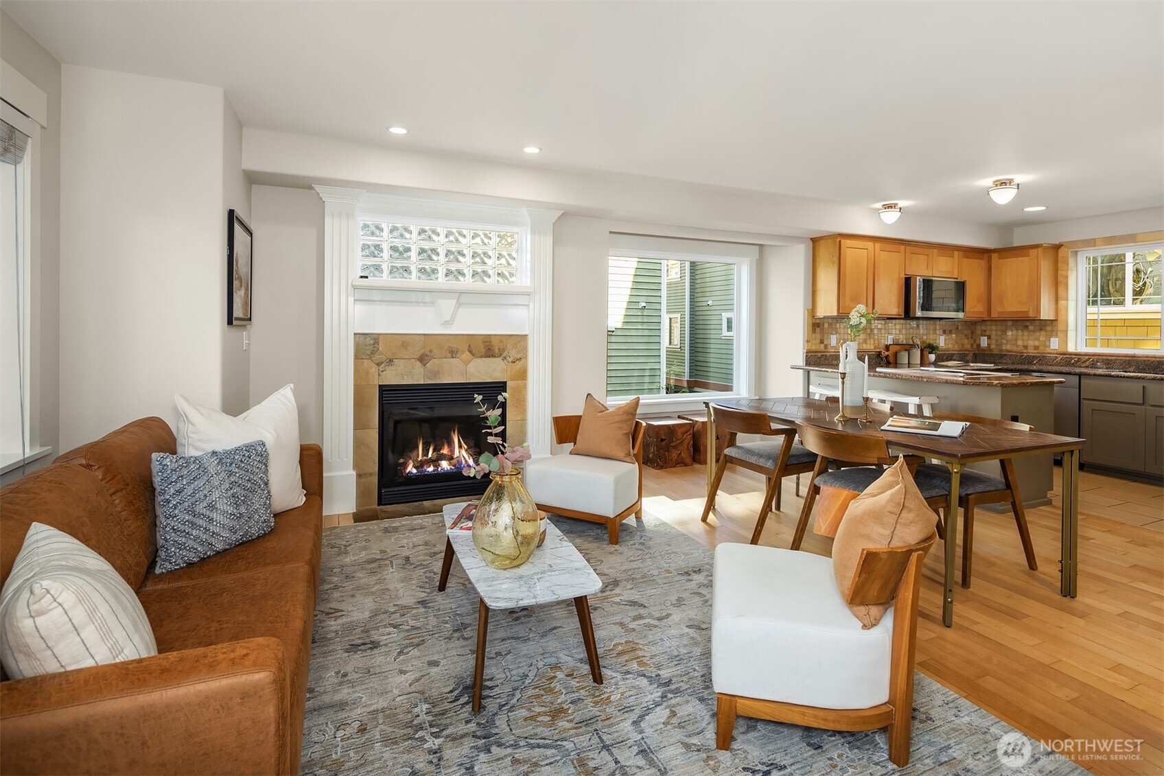 739 North 94th Street, Unit B Seattle, WA 98103 - Photo 14 of 39 a living room with furniture and a fireplace