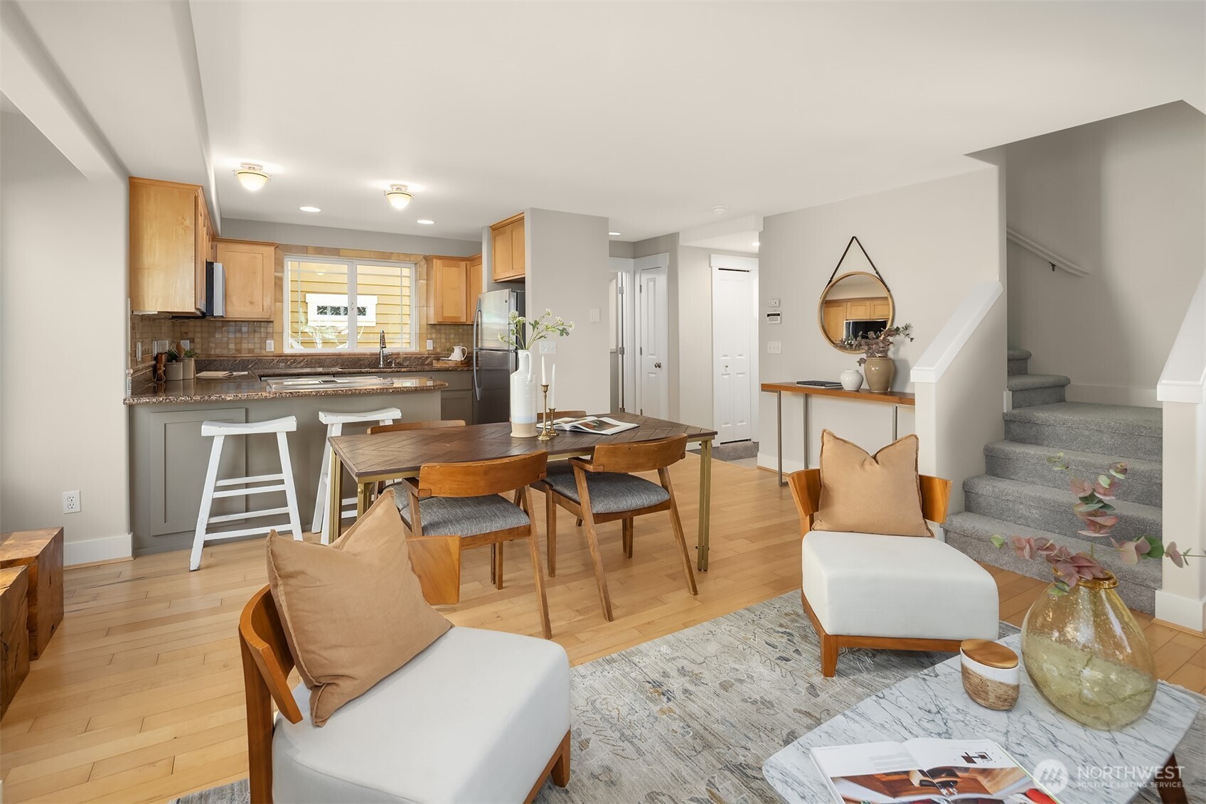 739 North 94th Street, Unit B Seattle, WA 98103 - Photo 15 of 39 a living room with lots of furniture and kitchen view