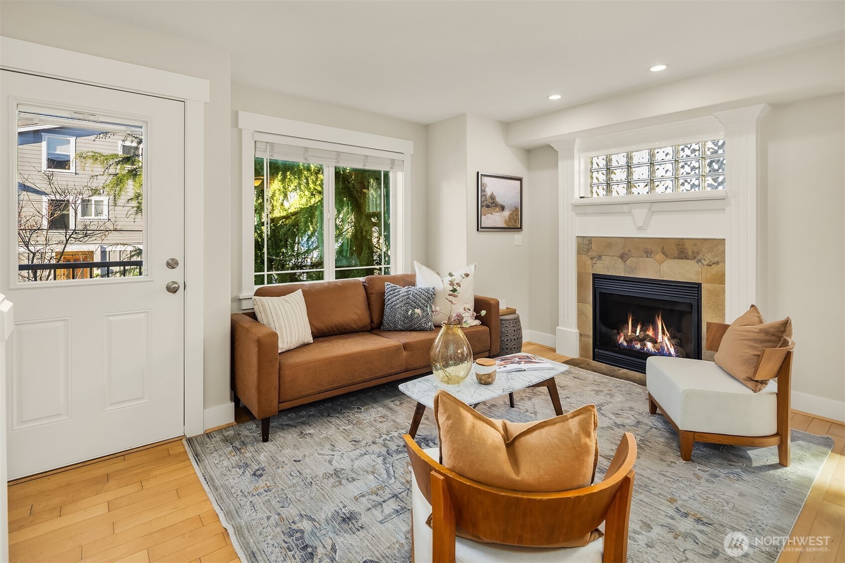 739 North 94th Street, Unit B Seattle, WA 98103 - Photo 16 of 39 a living room with furniture and a fireplace