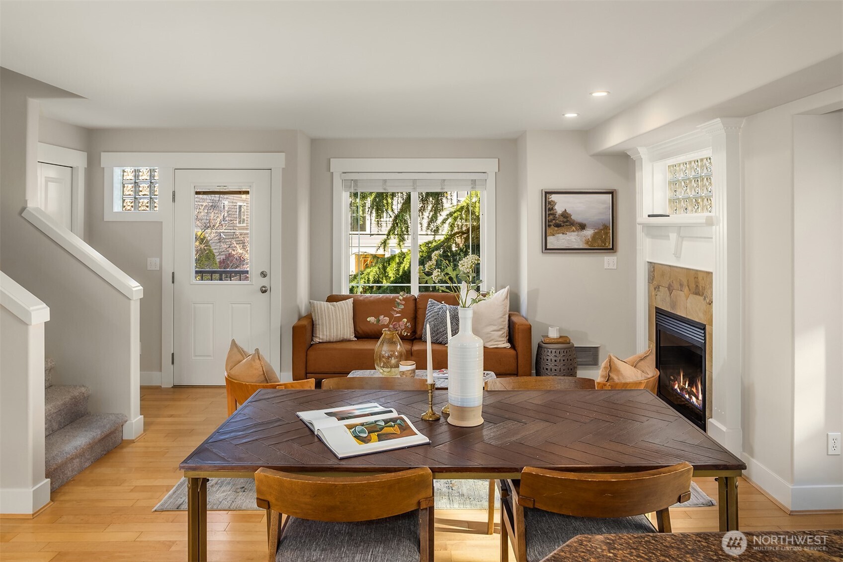 739 North 94th Street, Unit B Seattle, WA 98103 - Photo 26 of 39 a living room with furniture and a fireplace