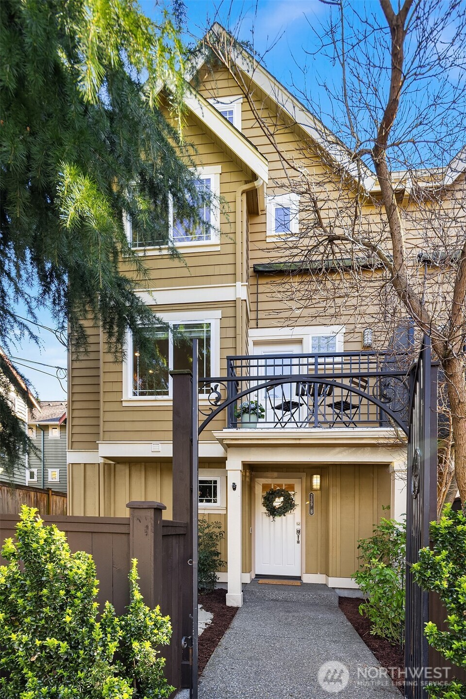 739 North 94th Street, Unit B Seattle, WA 98103 - Photo 35 of 39 front view of a house with a garden
