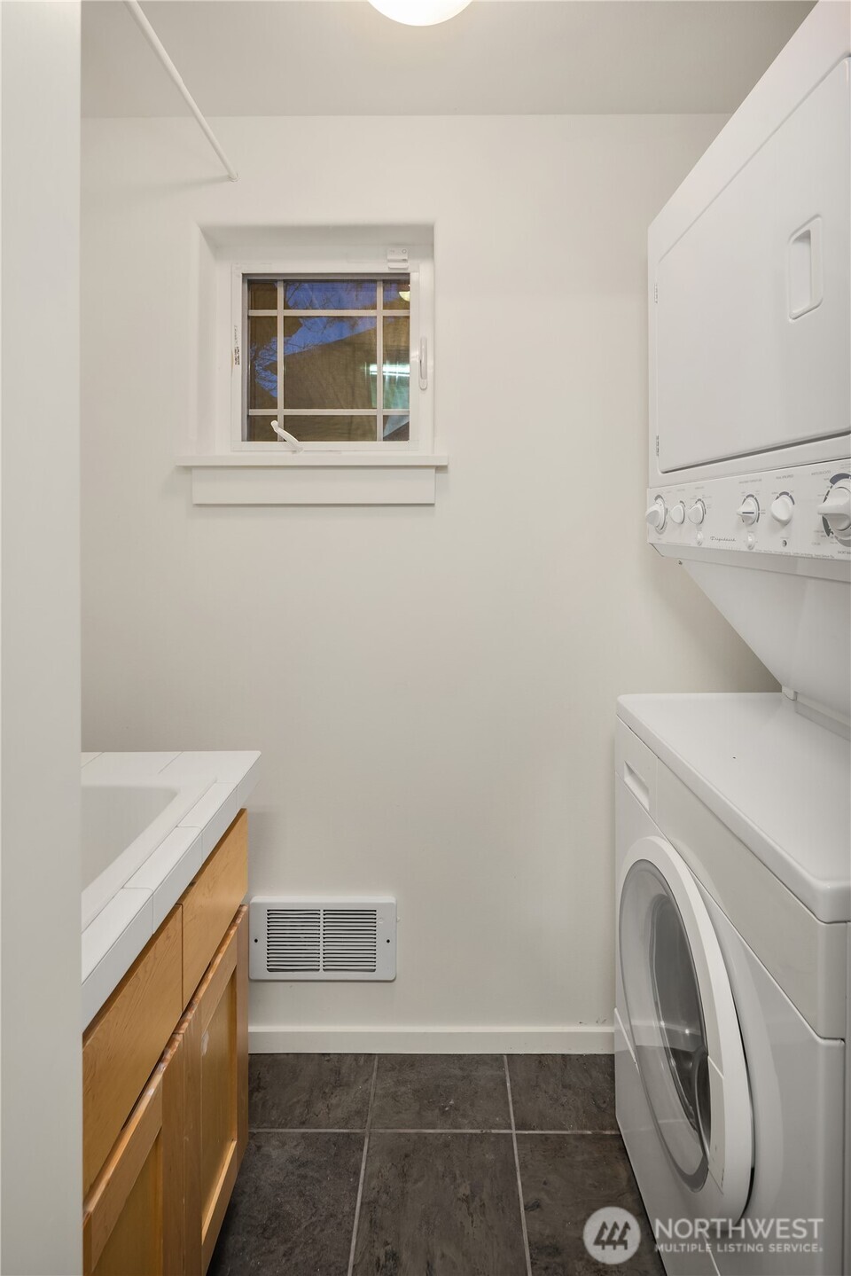 739 North 94th Street, Unit B Seattle, WA 98103 - Photo 36 of 39 a utility room with dryer and washer