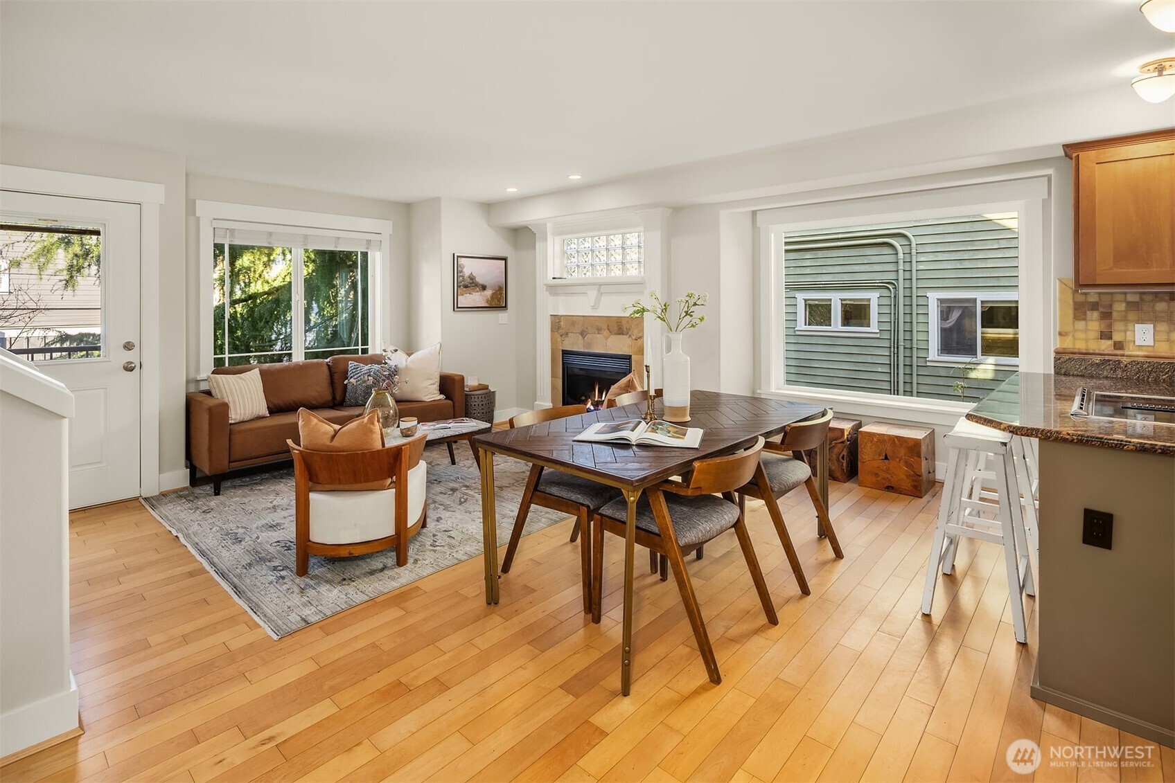 739 North 94th Street, Unit B Seattle, WA 98103 - Photo 5 of 39 a living room with furniture and a table