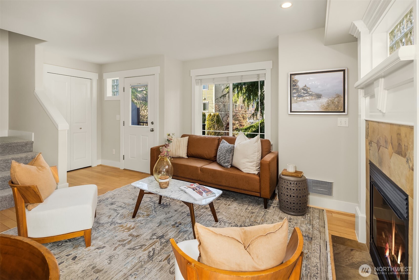 739 North 94th Street, Unit B Seattle, WA 98103 - Photo 8 of 39 a living room with furniture and a fireplace