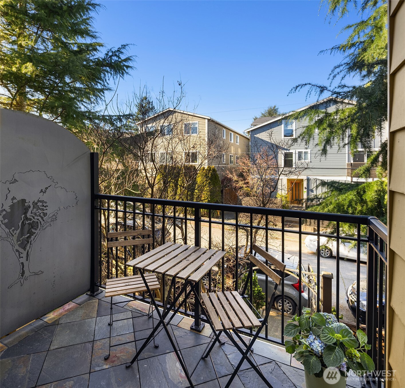 739 North 94th Street, Unit B Seattle, WA 98103 - Photo 9 of 39 a view of a balcony with chairs