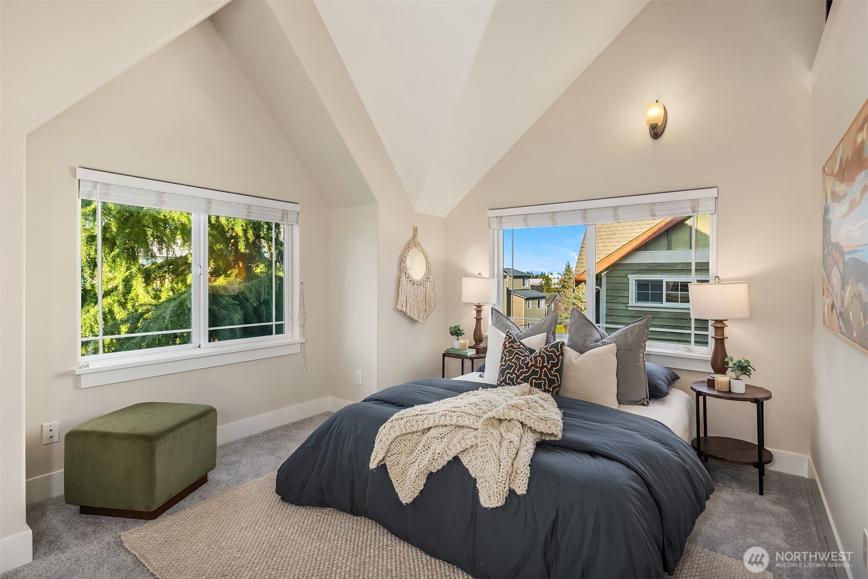 739 North 94th Street, Unit B Seattle, WA 98103 - Photo 10 of 39 a bed sitting in a bedroom next to a window