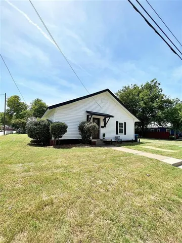 a house view with a garden space