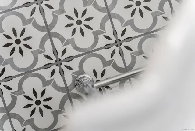 a view of a hallway with stairs