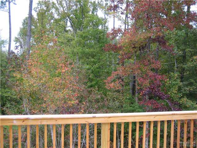 2133 Lower Lake Road Wake Forest, NC 27587 - Photo 17 of 25 Imagine sitting on your deck and enjoying this Beautiful wooded view... or enjoying your back yard!