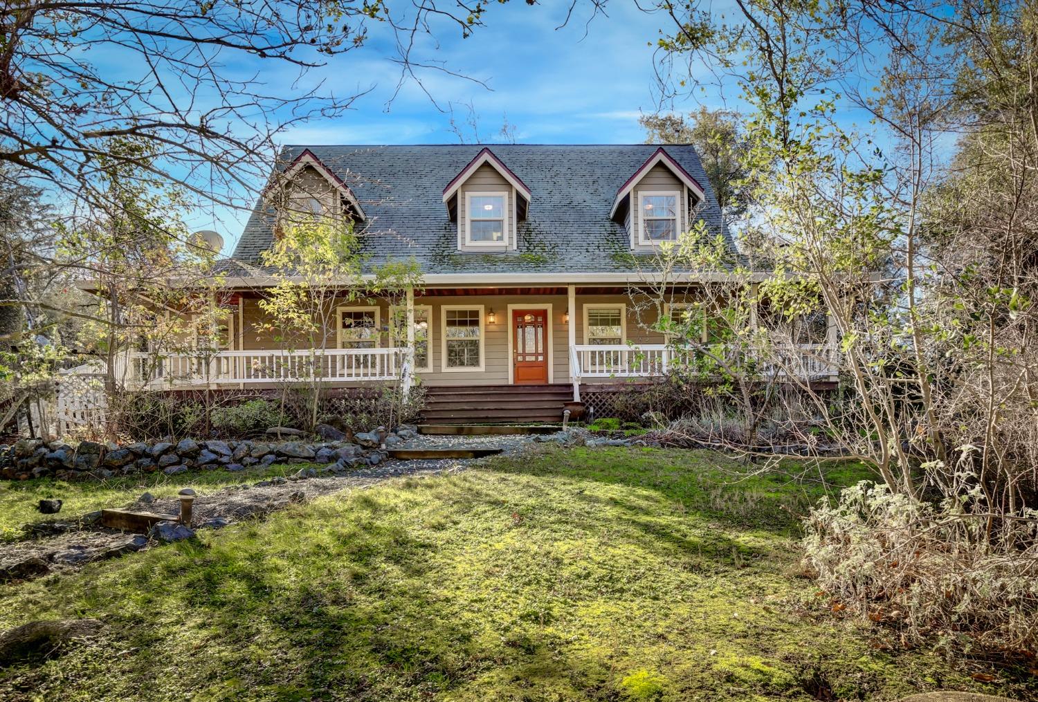 14666 Chukar Drive Grass Valley, CA 95949 - Photo 1 of 1 a view of front of house with a yard