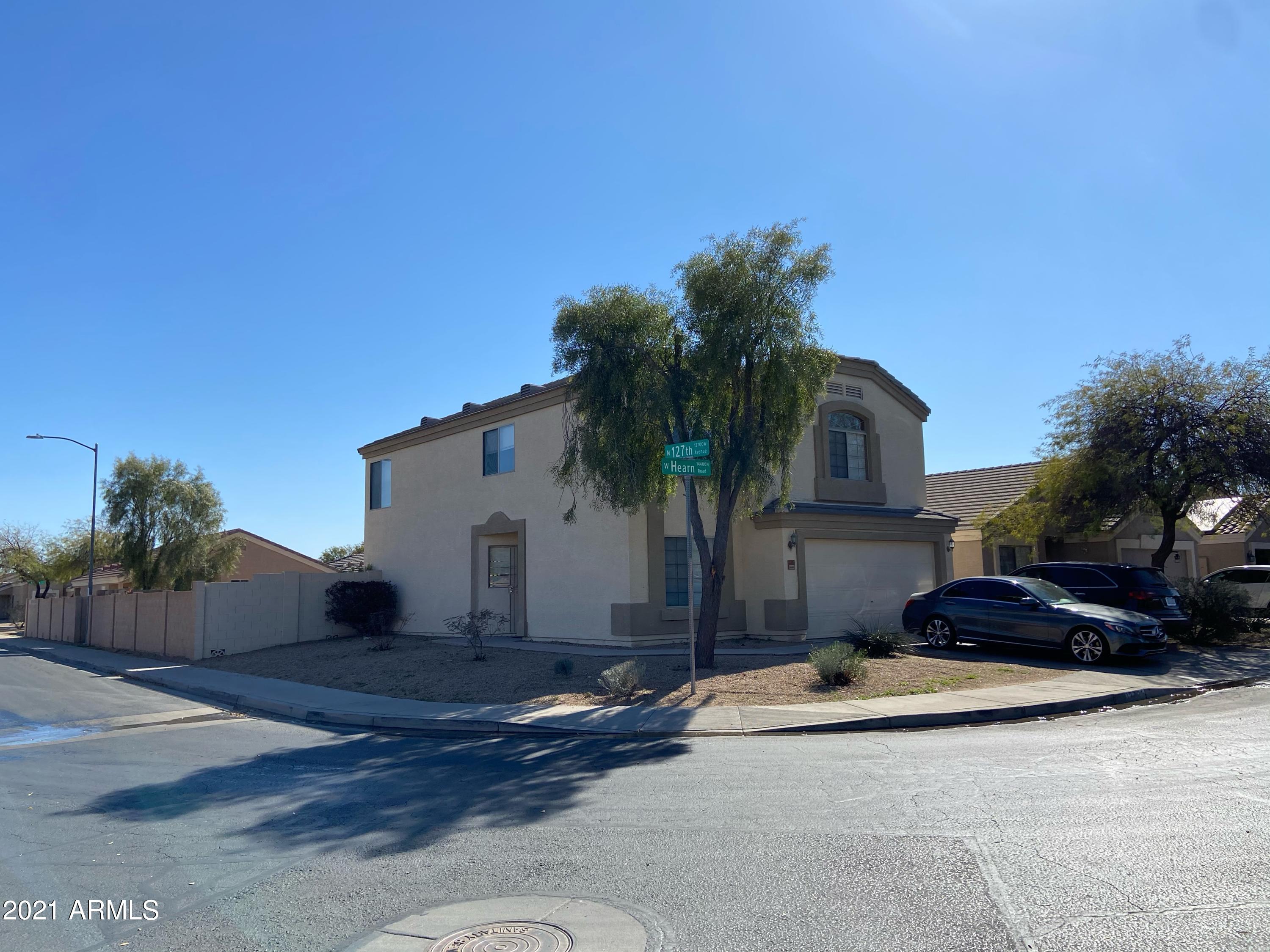 12701 West Hearn Road El Mirage, AZ 85335 - Photo 1 of 15 C6E7E1D5-AA4D-4A3F-9BB7-76146DE60E56