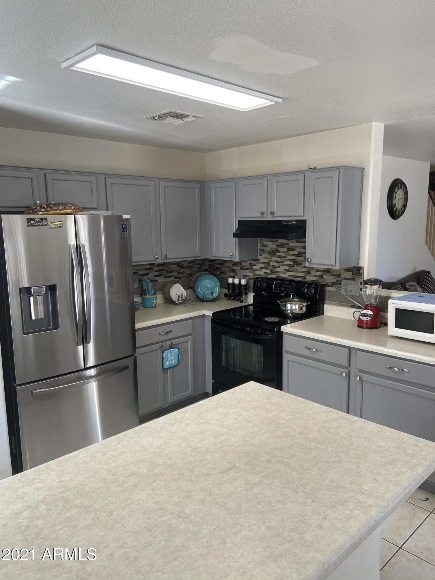12701 West Hearn Road El Mirage, AZ 85335 - Photo 3 of 15 C47D6581-0828-4C0D-BB7B-6B8C936ECA51