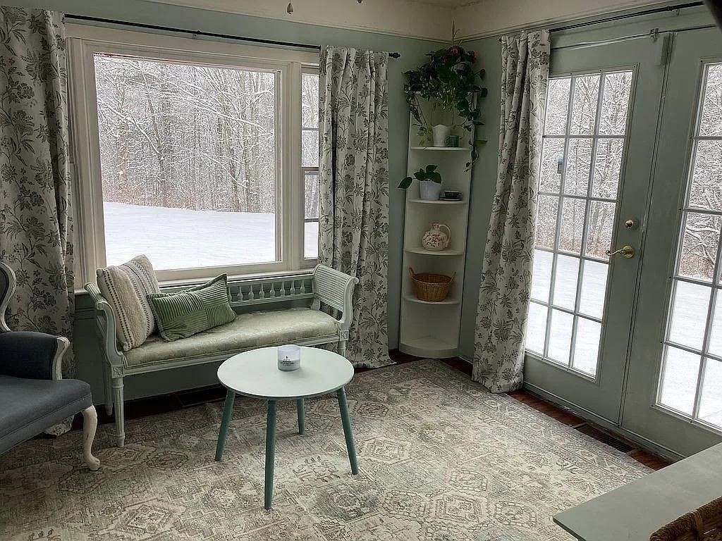 270 Wendell Depot Road Wendell, MA 01379 - Photo 11 of 42 a living room with furniture and a large window