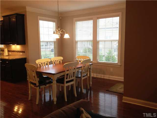 3614 Silver Forrest Lane Raleigh, NC 27614 - Photo 9 of 25 The kitchen opens to the breakfast room and family room. The large breakfast area easily accommodates a table for six and overlooks the back yard. A door to the right of the table leads to the screened porch. Breakfast Area