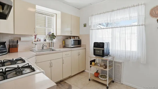 $699,999 | 106-17 95th Avenue | South Richmond Hill