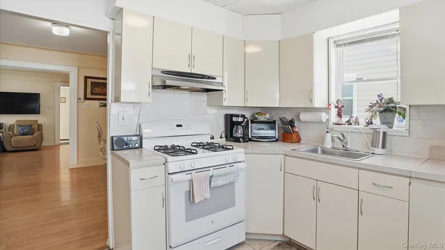 $699,999 | 106-17 95th Avenue | South Richmond Hill