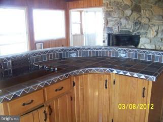 307 Farm Ridge Road Front Royal, VA 22630 - Photo 2 of 19 a bathroom with a sink and a mirror