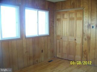 307 Farm Ridge Road Front Royal, VA 22630 - Photo 11 of 19 a view of an entryway with a wooden door