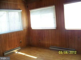 307 Farm Ridge Road Front Royal, VA 22630 - Photo 13 of 19 a view of an empty room with a window