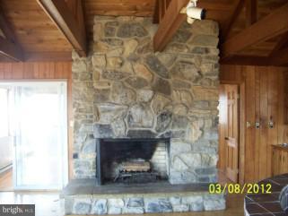 307 Farm Ridge Road Front Royal, VA 22630 - Photo 4 of 19 a room with a fireplace