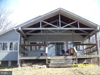 307 Farm Ridge Road Front Royal, VA 22630 - Photo 5 of 19 a view of a house with a small yard and wooden floor