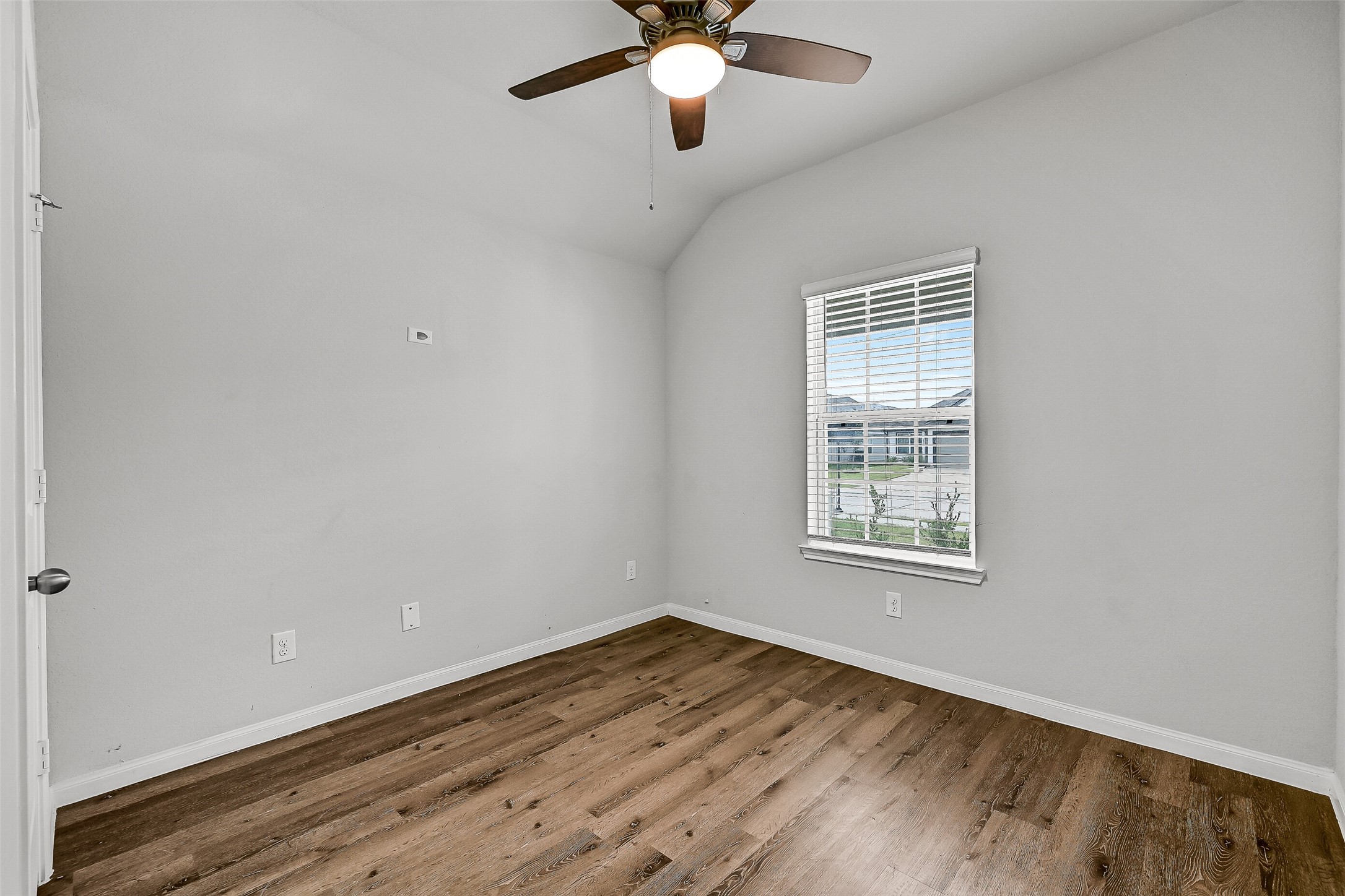 5407 James Michael Drive Rosharon, TX 77583 - Photo 23 of 32 wooden floor in an empty room with a window