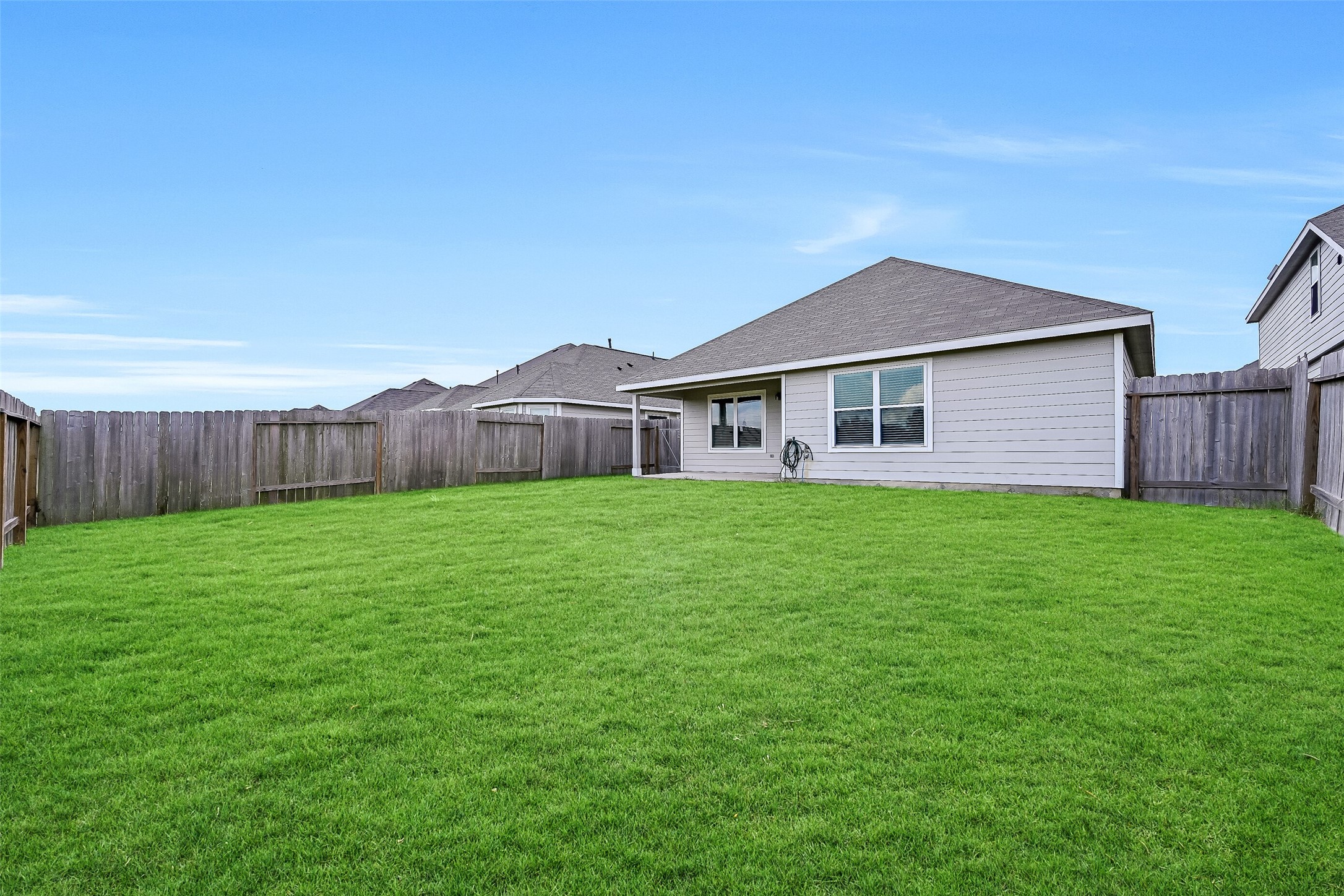 5407 James Michael Drive Rosharon, TX 77583 - Photo 28 of 32 a front view of house with a garden