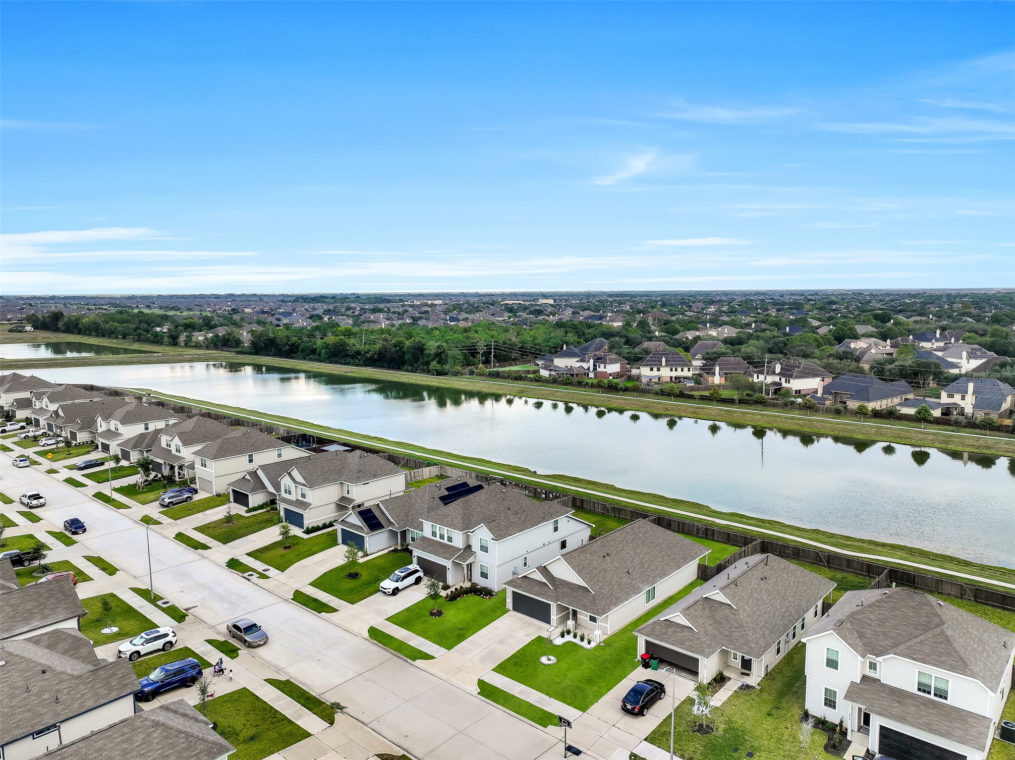 5407 James Michael Drive Rosharon, TX 77583 - Photo 3 of 32 a view of a city with an ocean