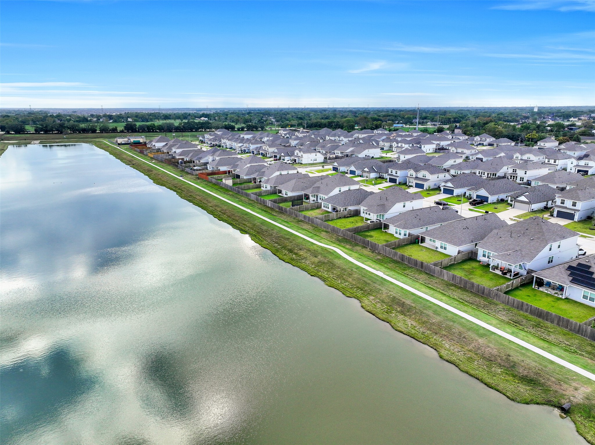 5407 James Michael Drive Rosharon, TX 77583 - Photo 31 of 32 a view of a city with a lake