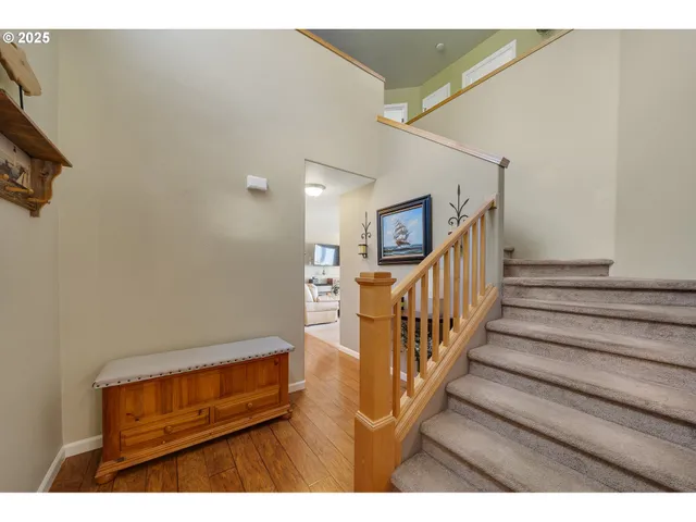 a view of entryway with wooden floor